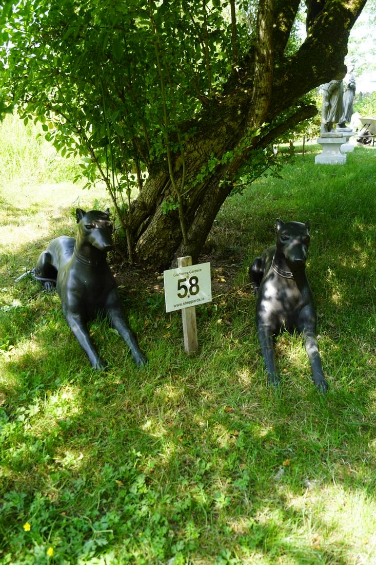 PAIR OF BRONZE GARDEN SCULPTURES: each a reclining whippet. 56 cm. high; 120 cm. long Approximate Time: 10:51 Lot No: 58 Category: Garden & Decorative Objects