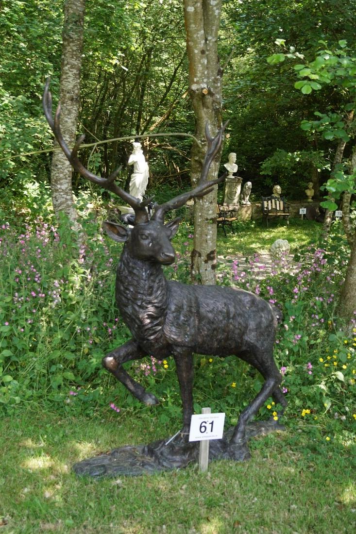 LARGE BRONZE GARDEN SCULPTURE: of a stag, standing on a rocky mound. 215 cm. high; 170 cm. wide; 55 cm. deep Approximate Time: 10:54 Lot No: 61 Category: Garden & Decorative Objects