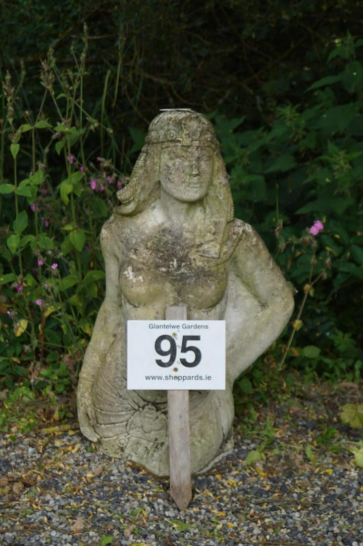 MOULDED STONE GARDEN SCULPTURE: 3/4 length figure of an Egyptian princess. 85 cm. high; Approximate Time: 11:24 Lot No: 95 Category: Garden & Decorative Objects
