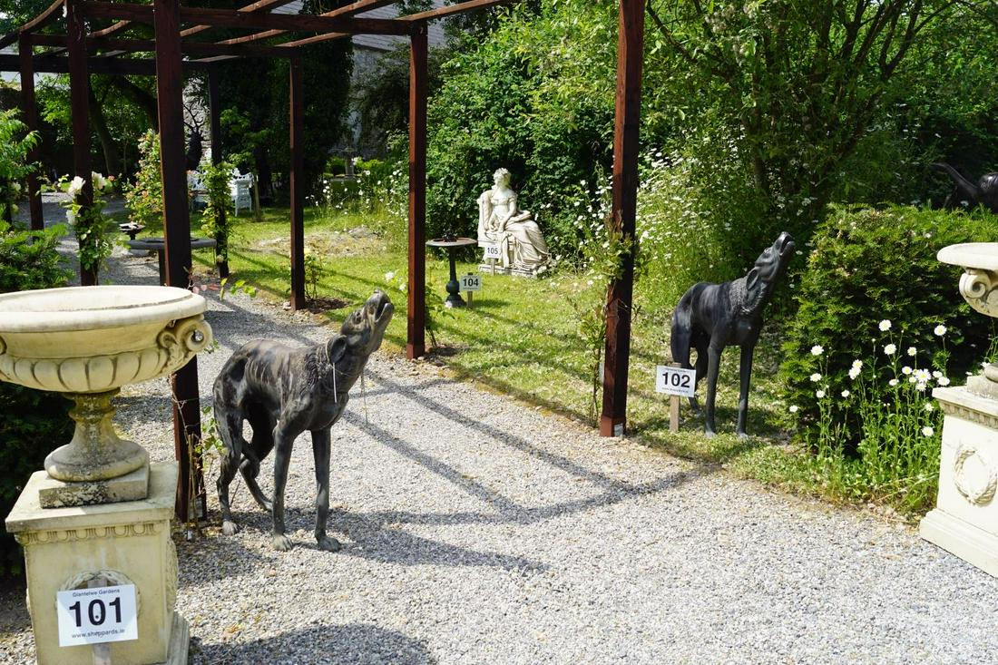 PAIR OF LARGE BRONZE GARDEN SCULPTURES: each a hound standing on all fours with its head held high. Approximate Time: 11:30 Lot No: 102 Category: Garden & Decorative Objects