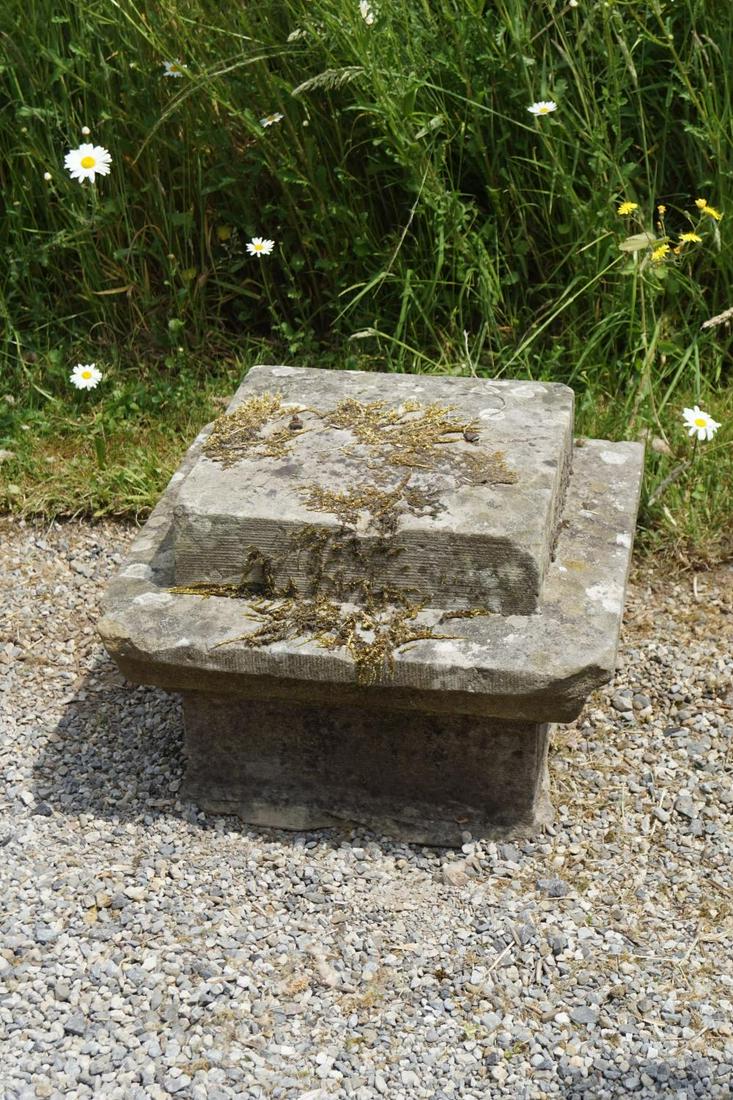 PAIR OF 18TH-CENTURY STONE PIER CAPS: each of square form, with moulded decoration. 60 cm. square Approximate Time: 11:47 Lot No: 120 Category: Garden & Decorative Objects