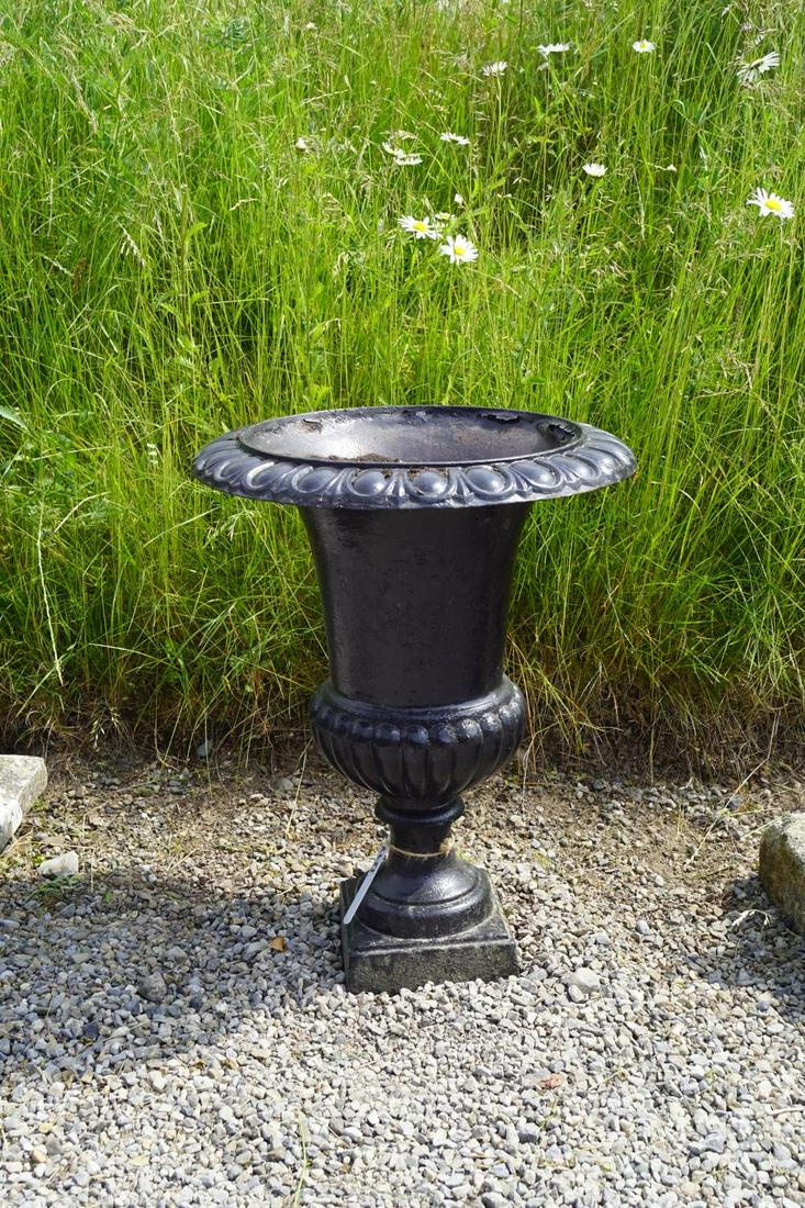 CAST IRON GARDEN URN: with egg and dart moulded decoration. 60 cm. high; 50 cm. wide Approximate Time: 12:15 Lot No: 151 Category: Garden & Decorative Objects