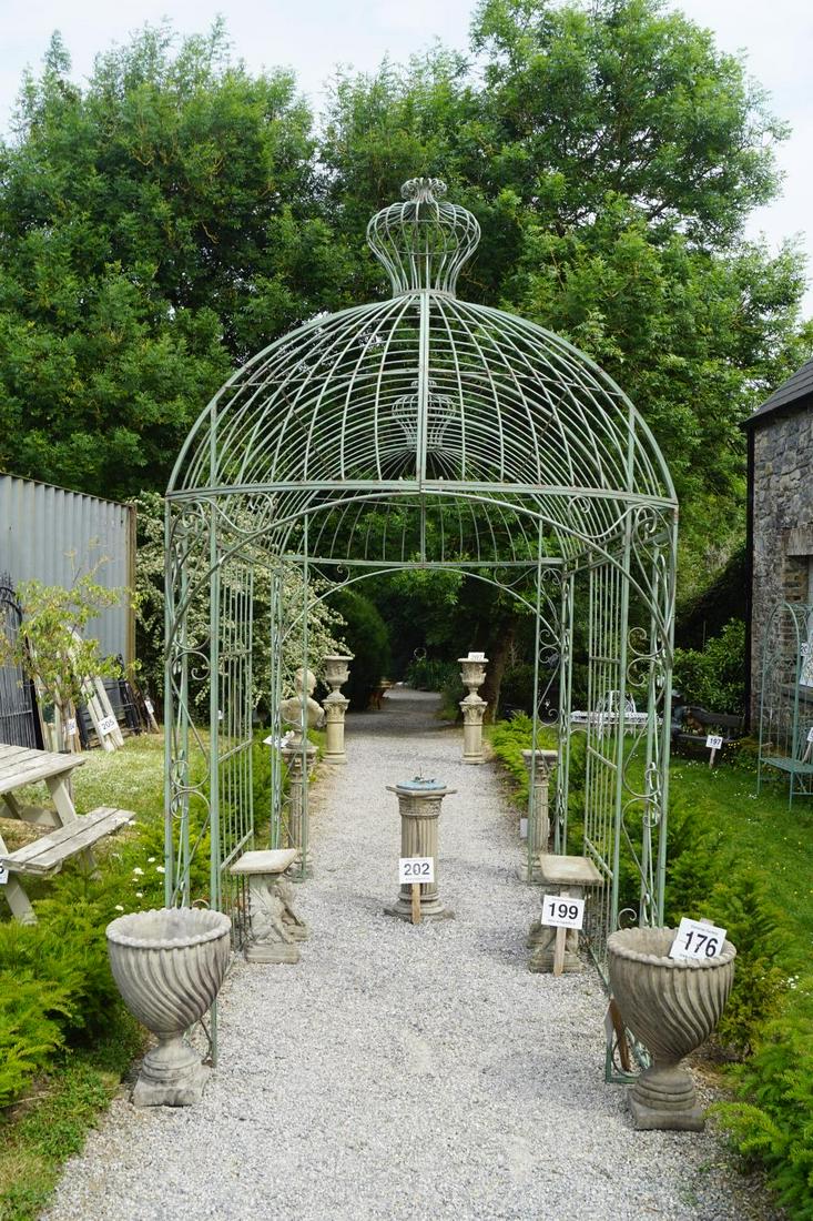 LARGE METAL WALKWAY: with a domed roof, raised on panelled supports. 300 cm. high; 360 cm. wide; 200 cm. deep Approximate Time: 12:41 Lot No: 180 Category: Garden & Decorative Objects