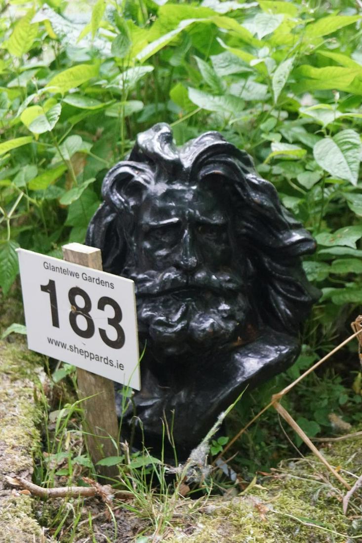 CAST IRON BUST OF POSEIDON: raised on a circular socle. 60 cm. high; 32 cm. wide; Approximate Time: 12:43 Lot No: 183 Category: Garden & Decorative Objects