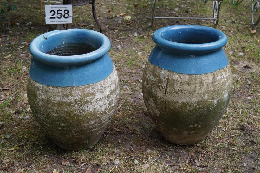 PAIR OF TERRACOTTA ANDUZE POTS: each with a glazed collar. 58 cm. high; 40 cm. diameter Approximate Time: 12:57 Lot No: 198 Category: Garden & Decorative Objects