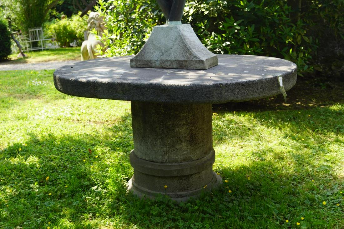 LARGE LIMESTONE GARDEN TABLE: the substantial oval-shaped top, raised on a cylindrical support. Approximate Time: 14:08 Lot No: 210 Category: Garden & Decorative Objects