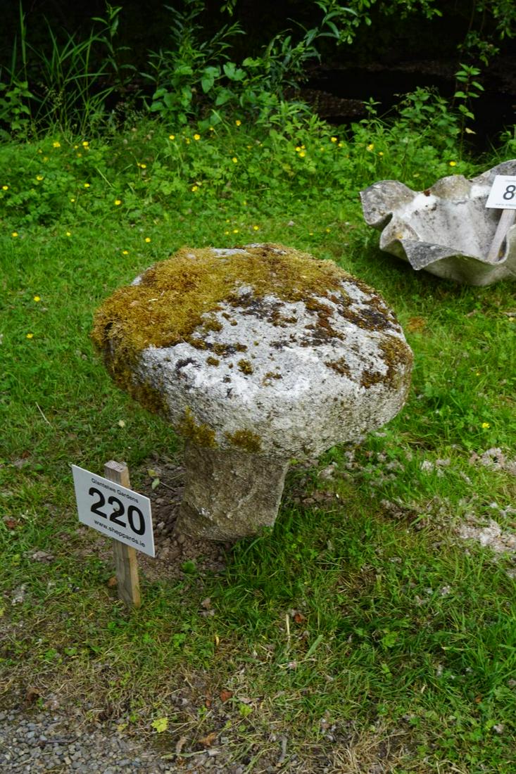 18TH-CENTURY STADDLE STONE: Granite, with a circular mushroom-shaped top. 60 cm. high; 68 cm. wide; Approximate Time: 14:17 Lot No: 220 Category: Garden & Decorative Objects