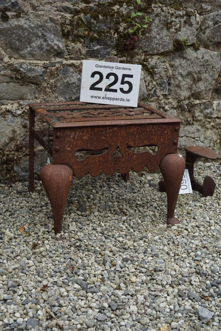 18TH-CENTURY CAST IRON TRIVIT: 18th-century cast iron trivet. 34 cm. high; 46 cm. wide; 38 cm. deep; Approximate Time: 14:21 Lot No: 225 Category: Garden & Decorative Objects