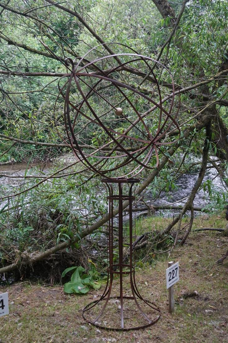LARGE WROUGHT IRON ARMILLARY SPHERE: on stand. 210 cm. high; 90 cm. wide Approximate Time: 14:23 Lot No: 227 Category: Garden & Decorative Objects