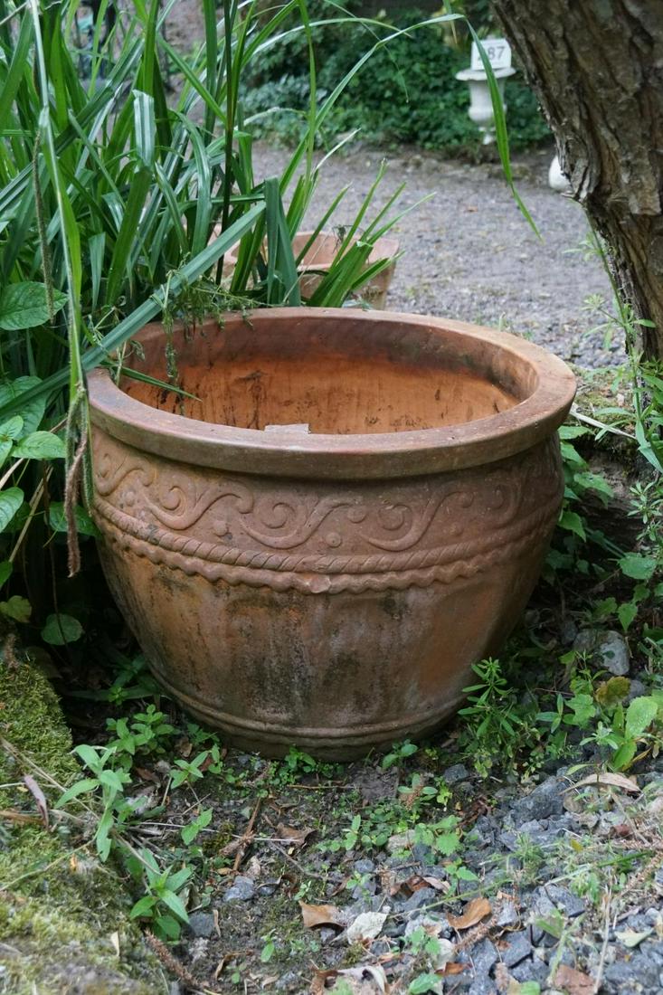 LARGE TERRACOTTA GARDEN PLANTER: of baluster fluted form with Vitruvian scroll decoration. 45 cm. high; 59 cm. in diameter; Approximate Time: 14:27 Lot No: 231 Category: Garden & Decorative Objects