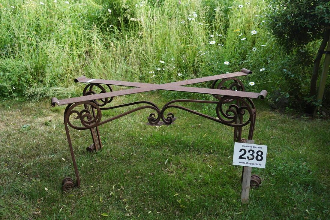 LARGE FRENCH WROUGHT IRON GARDEN TABLE: raised on open scroll legs. 72 cm. high; 147 cm. long Approximate Time: 14:33 Lot No: 238 Category: Garden & Decorative Objects