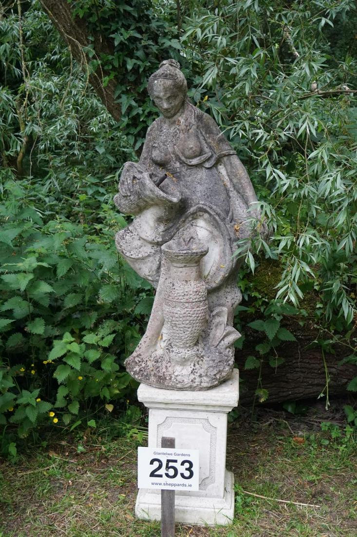 MOULDED STONE GARDEN SCULPTURE: Figure of a lady with a vase. 120 cm. high; Approximate Time: 14:46 Lot No: 253 Category: Garden & Decorative Objects