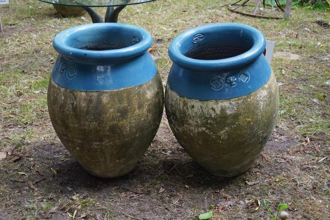 PAIR OF TERRACOTTA ANDUZE POTS: each with a glazed collar. 58 cm. high; 40 cm. diameter Approximate Time: 15:10 Lot No: 279 Category: Garden & Decorative Objects