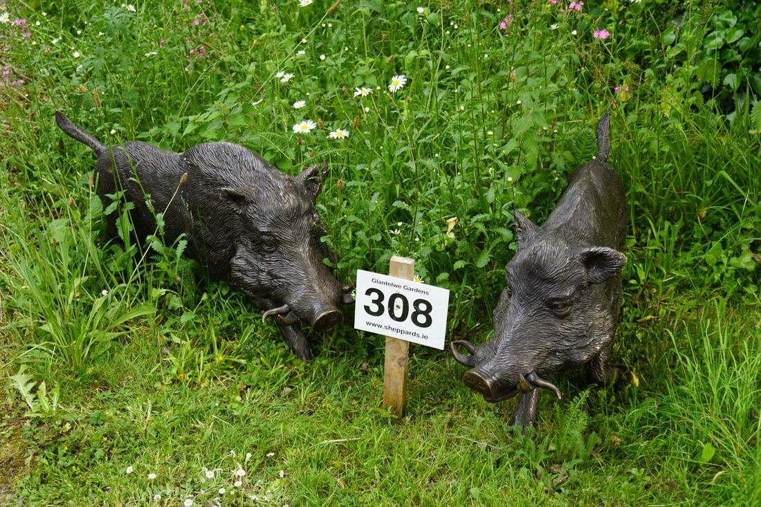 PAIR OF BRONZE GARDEN SCULPTURES: each a wild boar. 50 cm. high; 110 cm. wide; Approximate Time: 15:36 Lot No: 308 Category: Garden & Decorative Objects