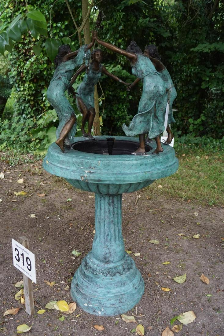 LARGE BRONZE GARDEN FOUNTAIN: of circular form surmounted by dancing nymphs, raised on fluted stem and ornate circular base. Approximate Time: 15:46 Lot No: 319 Category: Garden & Decorative Objects