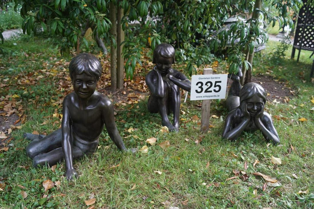 GROUP OF THREE BRONZE GARDEN SCULPTURES: 3 young children. 58 cm. high; 80 cm. wide; Approximate Time: 15:51 Lot No: 325 Category: Garden & Decorative Objects