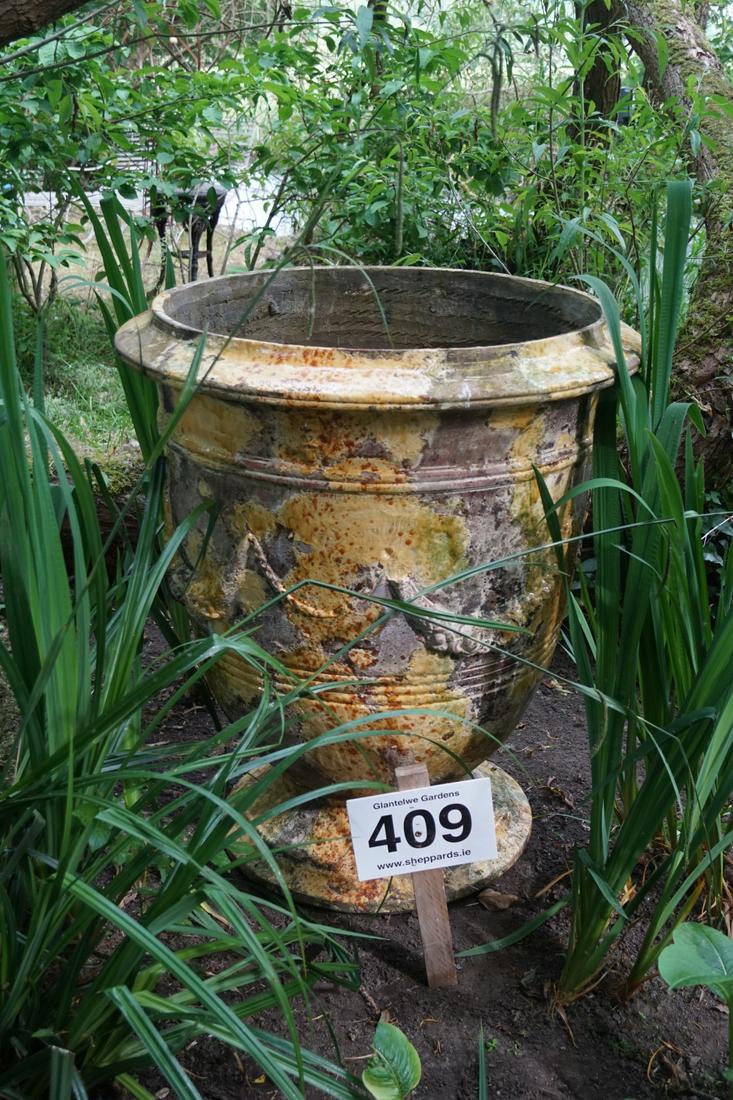 LARGE GLAZED ANDUZE POT: of vase shape, the body with moulded swag decoration. 100 cm. high; 90 cm. diameter Approximate Time: 10:07 Lot No: 409 Category: Garden & Decorative Objects