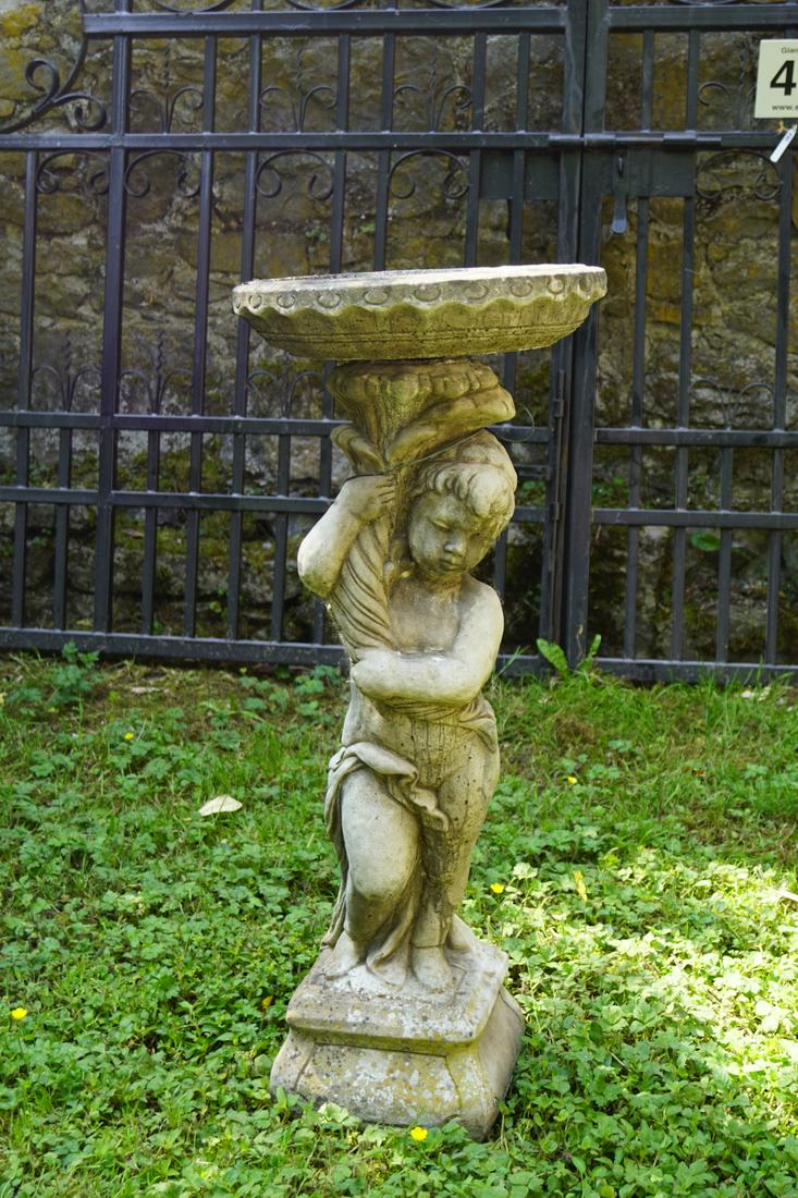 MOULDED STONE BIRD BATH: of circular form, raised on a cherub stem and square base. 85 cm. high; 38 cm. in diameter; Approximate Time: 10:15 Lot No: 418 Category: Garden & Decorative Objects