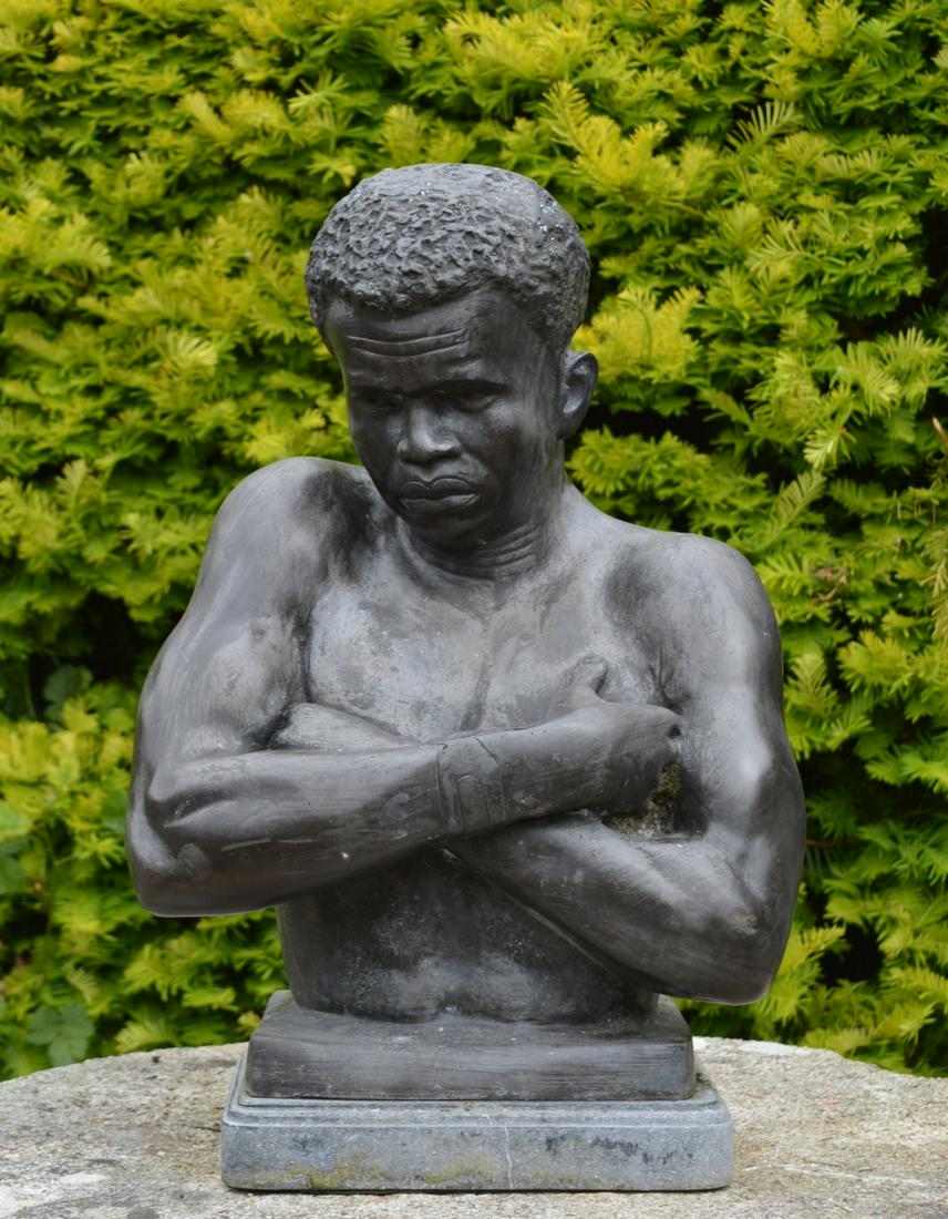 BRONZE GARDEN SCULPTURE: Torso of a Nubian figure. 64 cm. high; 43 cm. wide; Approximate Time: 10:24 Lot No: 428 Category: Garden & Decorative Objects