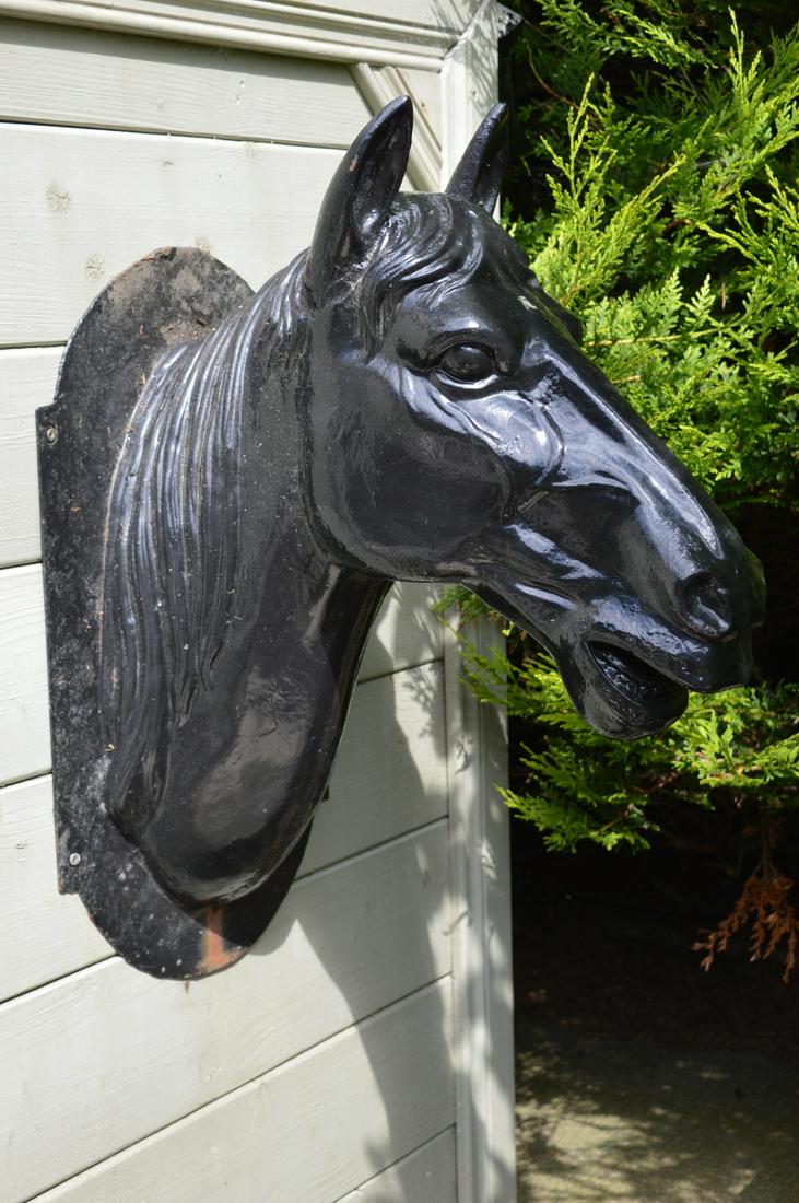 WALL-MOUNTED CAST IRON SCULPTURE: Equine study. Approximate Time: 10:27 Lot No: 431 Category: Garden & Decorative Objects