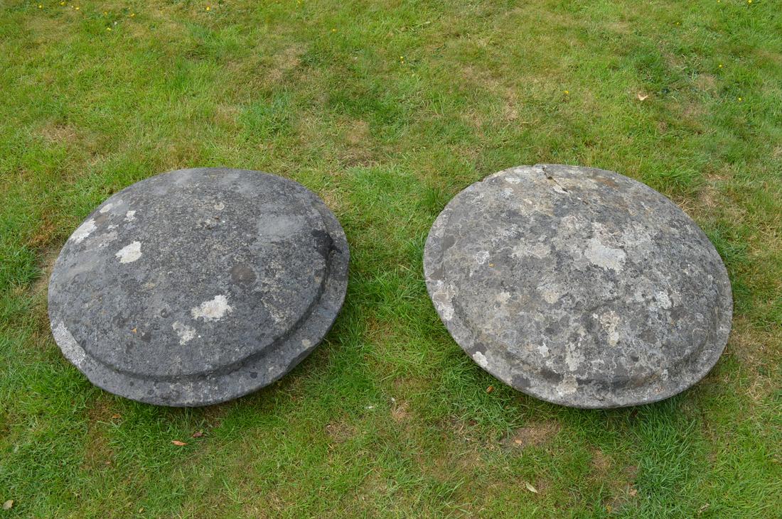 PAIR OF GEORGIAN CARVED LIMESTONE PIER CAPS: each of circular domed shaped. Approximate Time: 10:28 Lot No: 433 Category: Garden & Decorative Objects