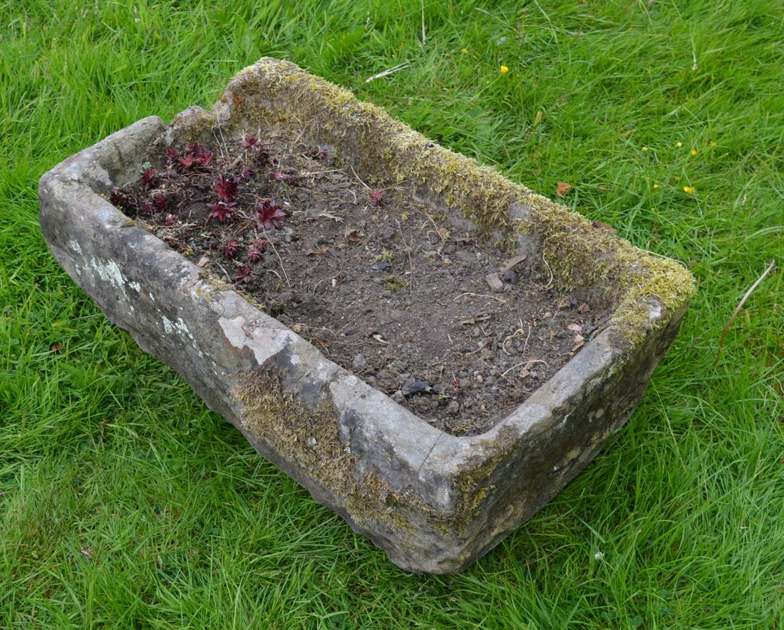 LARGE 18TH-CENTURY STONE TROUGH: of rectangular shape. 33 cm. high; 78 cm. wide; 81 cm. deep Approximate Time: 10:30 Lot No: 435 Category: Garden & Decorative Objects