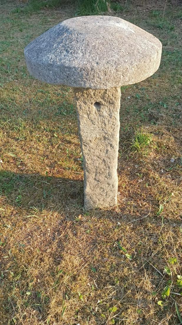 19TH-CENTURY GRANITE STADDLE STONE: of mushroom shape, raised on a square stem 100 cm. high; 50 cm. wide; Approximate Time: 10:43 Lot No: 449 Category: Garden & Decorative Objects