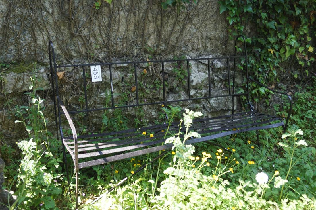 REGENCY WROUGHT IRON GARDEN BENCH: with a railed back and slatted seat, raised on scroll ends. 150 cm. wide; Approximate Time: 10:49 Lot No: 456 Category: Garden & Decorative Objects
