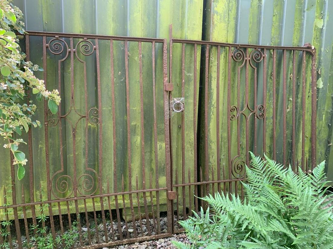 PAIR OF IRON ESTATE ENTRANCE GATES: Pair of iron estate entrance gates 180 cm. high; 306 cm. wide Approximate Time: 11:16 Lot No: 486 Category: Garden & Decorative Objects