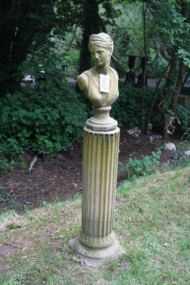 MOULDED STONE GARDEN SCULPTURE: Bust of Diana, supported on a fluted column Approximate Time: 11:30 Lot No: 502 Category: Garden & Decorative Objects