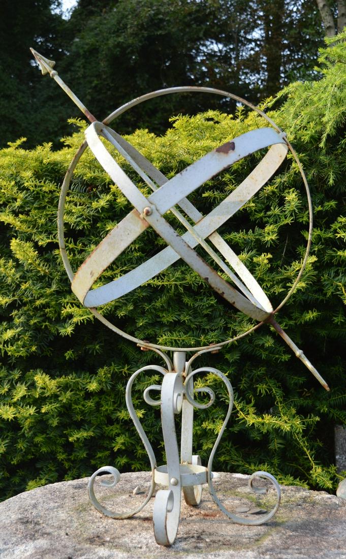 19TH-CENTURY GARDEN ARMILLARY SPHERE: Cast iron, raised on scroll feet. Approximate Time: 11:45 Lot No: 518 Category: Garden & Decorative Objects