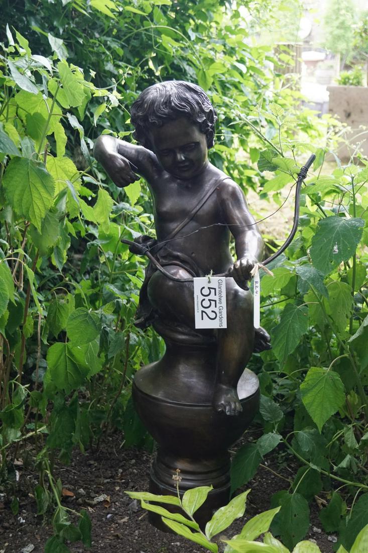 BRONZE GARDEN SCULPTURE: Figure of a cherub with a bow. 100 cm. high; 55 cm. wide; Approximate Time: 12:15 Lot No: 552 Category: Garden & Decorative Objects