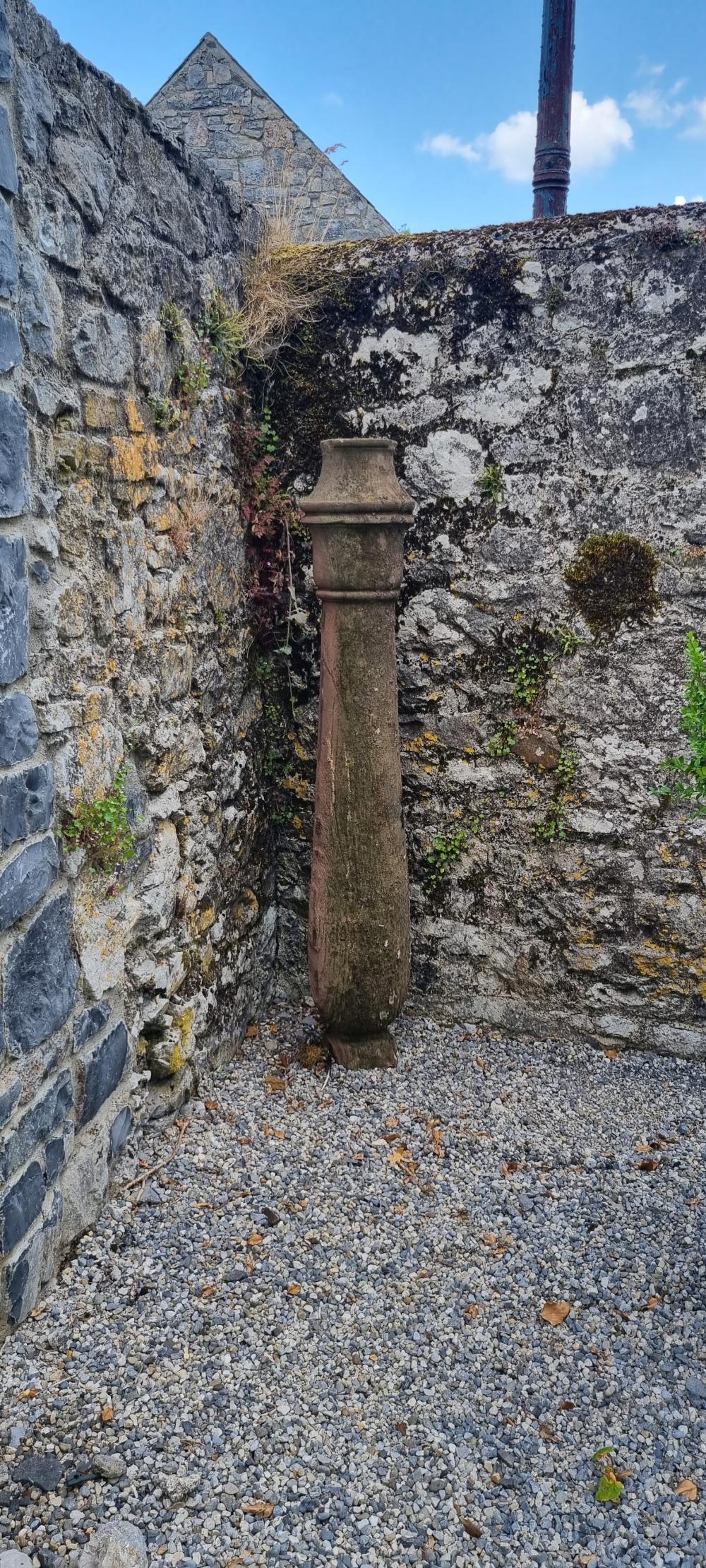 PAIR OF SCULPTED STONE CLASSICAL COLUMNS: each with a leaf carved stem. Approximate Time: 12:36 Lot No: 575 Category: Garden & Decorative Objects