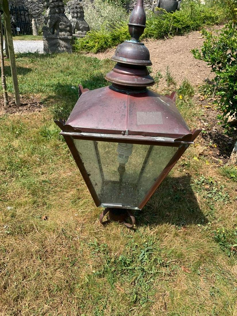 SET OF 4 COPPER GARDEN LIGHTS: each of square tapered form. 90 cm. high; 40 cm. wide; 40 cm. deep; Approximate Time: 12:37 Lot No: 576 Category: Garden & Decorative Objects