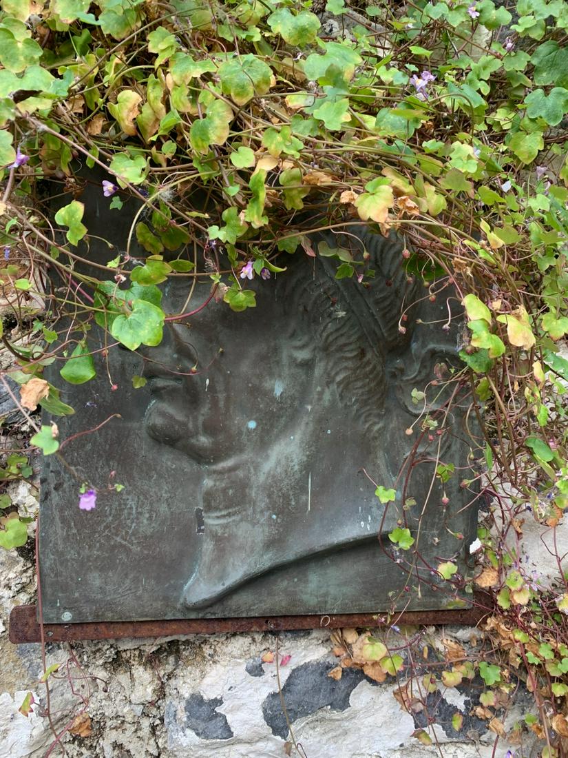 19TH-CENTURY BRONZE PLAQUE: depicting the head of Caesar Augustus in profile. 30 cm. high Approximate Time: 12:38 Lot No: 577 Category: Garden & Decorative Objects