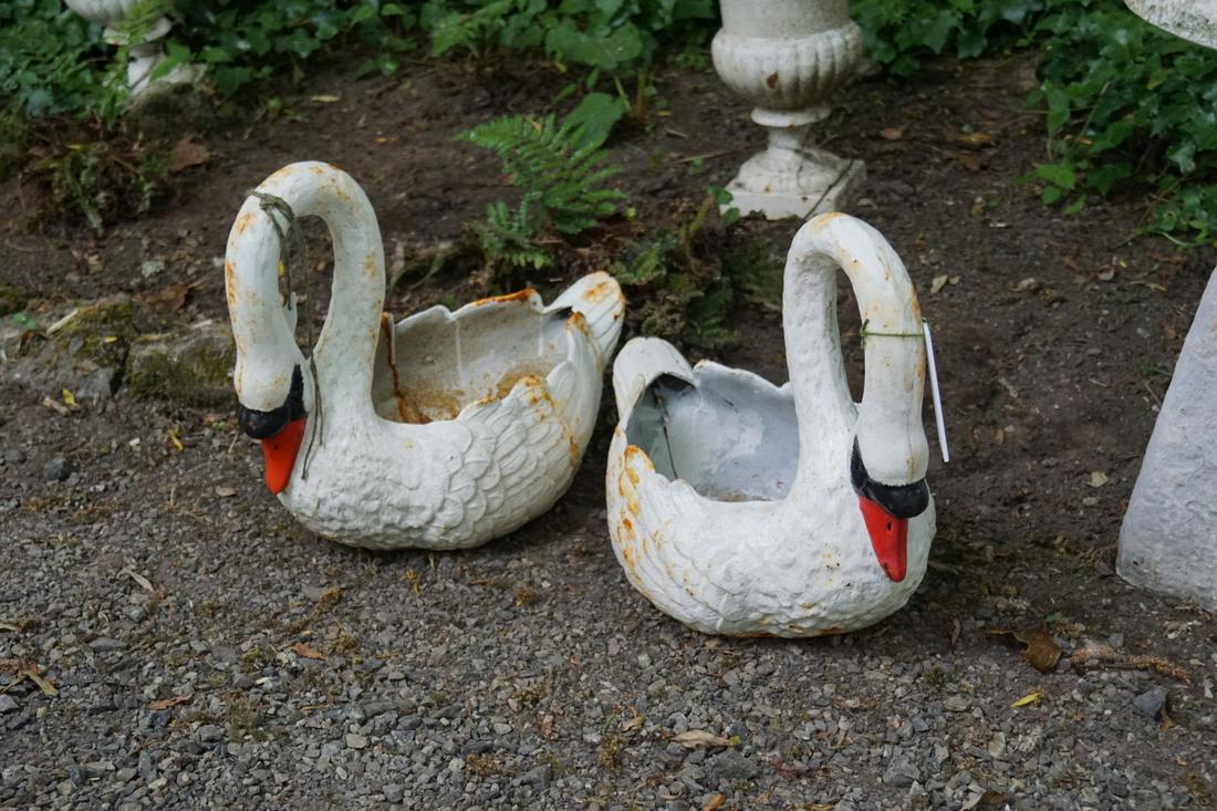 PAIR OF CAST IRON GARDEN PLANTERS: each in the form of a swan. Approximate Time: 12:41 Lot No: 580 Category: Garden & Decorative Objects