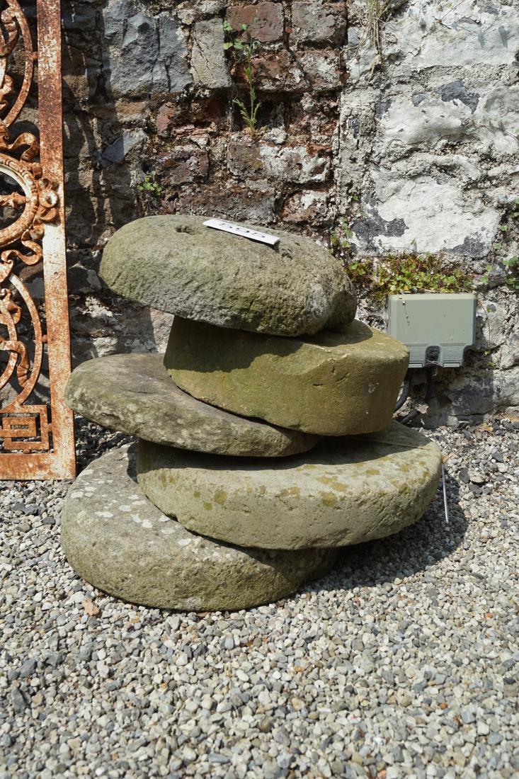 COLLECTION OF FIVE 19TH-CENTURY GRINDING STONES: each of circular shape. Approximate Time: 12:54 Lot No: 595 Category: Garden & Decorative Objects