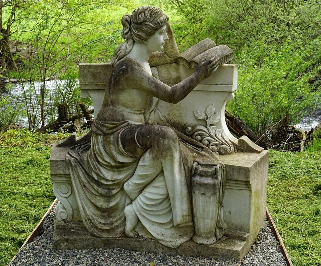 19TH-CENTURY MARBLE SCULPTURE: Figure of a lady seated on a garden bench. 125 cm. high; 120 cm. wide Approximate Time: 14:02 Lot No: 604 Category: Garden & Decorative Objects