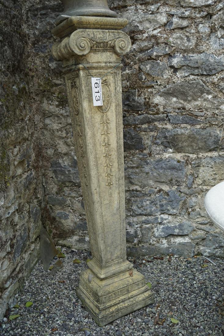 NEO-CLASSICAL MOULDED STONE PLINTH: of square tapered form, below scroll volutes, raised on a stepped square moulded base. 117 cm. high Approximate Time: 14:10 Lot No: 613 Category: Garden & Decorative Objects