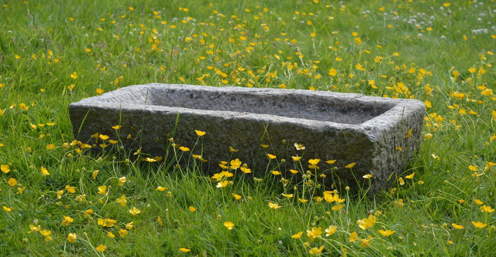 GRANITE STONE TROUGH: of rectangular form. 14 cm. high; 48 cm. wide; 23 cm. deep; Approximate Time: 14:15 Lot No: 618 Category: Garden & Decorative Objects