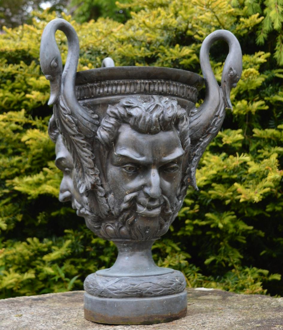 BRONZE JARDINIERE: with mask and ornithological decoration. 58 cm. high; 43 cm. wide Approximate Time: 14:24 Lot No: 628 Category: Garden & Decorative Objects