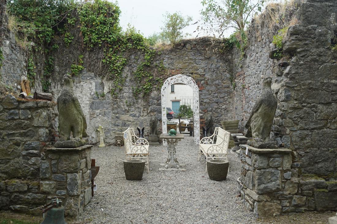 PAIR OF 19TH-CENTURY MOULDED STONE ESTATE FIGURES: each an eagle. 100 cm. high; 100 cm. wide Approximate Time: 14:33 Lot No: 638 Category: Garden & Decorative Objects