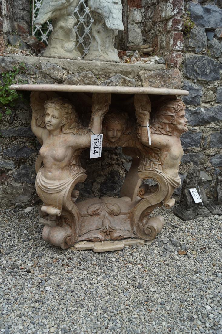 LARGE CLASSICAL MARBLE GARDEN CONSOLE TABLE: the serpentine-shaped top, raised on figural supports. 80 cm. high; 90 cm. wide; 70 cm. deep; Approximate Time: 14:38 Lot No: 644 Category: Garden & Decorative Objects