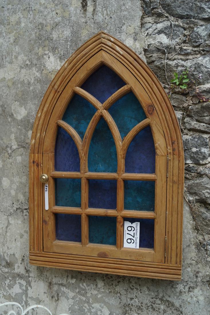 ARCHITECTURAL GOTHIC ARCH FRAMED WINDOW: Pine with glazed panels. 95 cm. high; 60 cm. wide Approximate Time: 15:07 Lot No: 676 Category: Garden & Decorative Objects