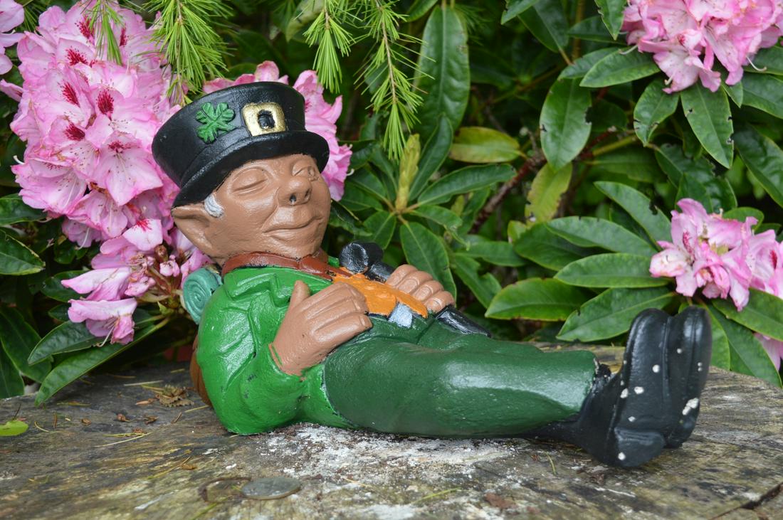 MOULDED STONE GARDEN SCULPTURE: Figure of a leprechaun. Approximate Time: 15:39 Lot No: 711 Category: Garden & Decorative Objects