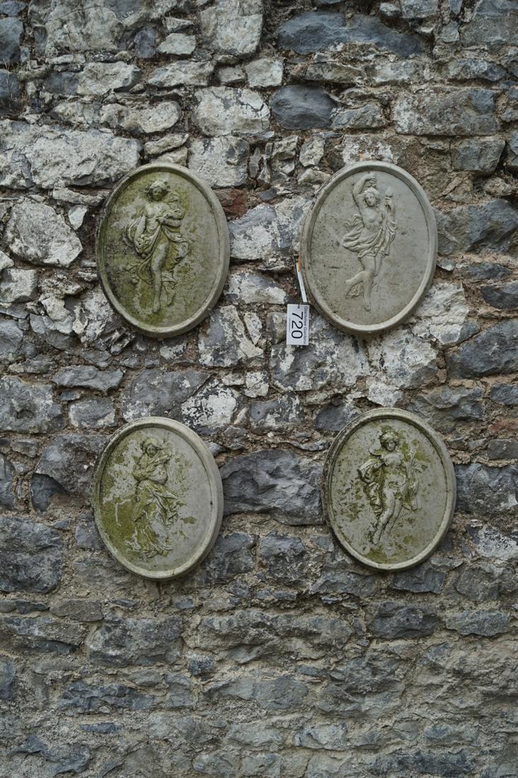 SET OF 4 COMPOSITE GARDEN WALL PLAQUES: each an allegory of the four seasons. 42 cm. high; 35 cm. wide; Approximate Time: 15:47 Lot No: 720 Category: Garden & Decorative Objects