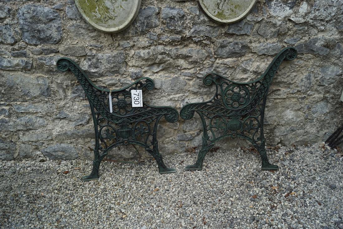 PAIR OF 19TH-CENTURY CAST IRON GARDEN ENDS: each of scroll form, with flower head decoration. 76 cm. high; 60 cm. wide Approximate Time: 15:56 Lot No: 730 Category: Garden & Decorative Objects