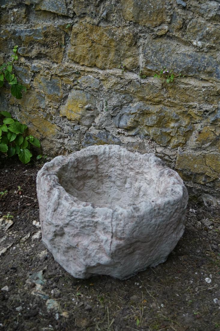 NATURALISTIC GARDEN TROUGH: of circular hewn form. 32 cm. high; 50 cm. in diameter; Approximate Time: 15:57 Lot No: 731 Category: Garden & Decorative Objects