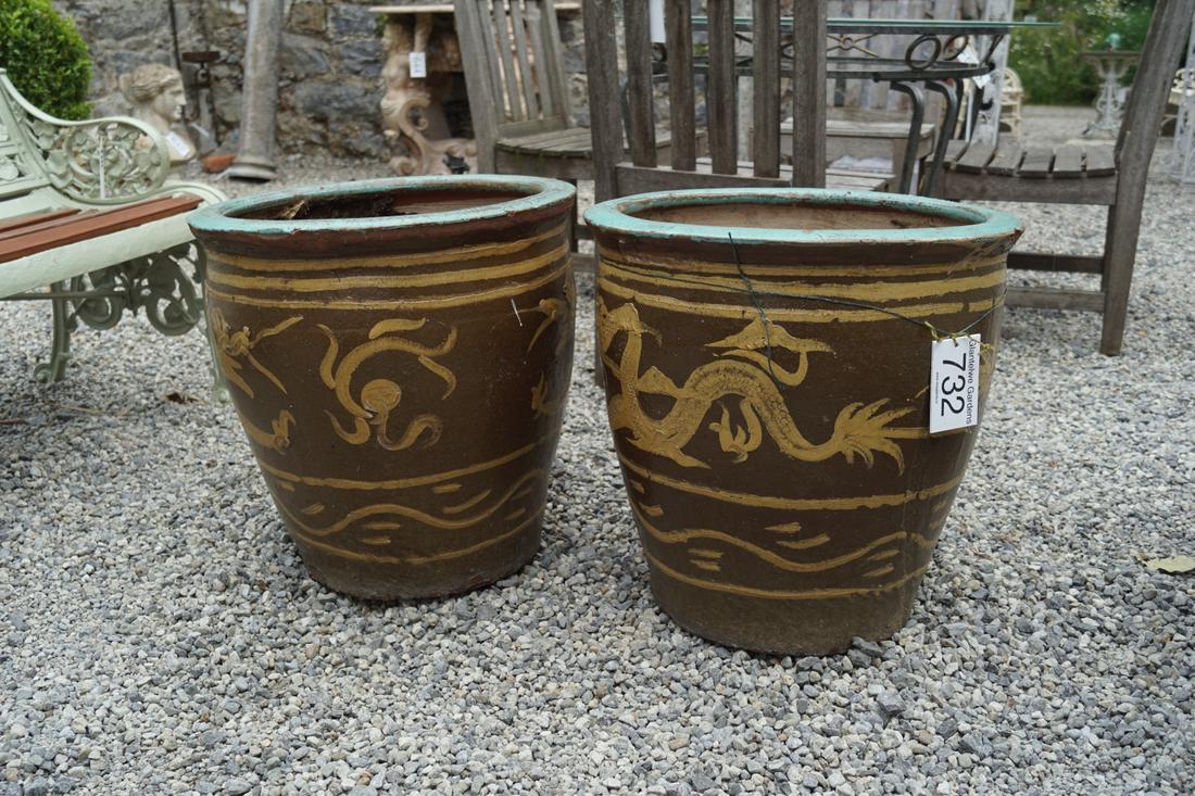 PAIR OF CHINESE GLAZED TERRACOTTA JARDINIERES: each of ovoid from with dragon scroll decoration. 50 cm. high; 50 cm. wide; Approximate Time: 15:57 Lot No: 732 Category: Garden & Decorative Objects