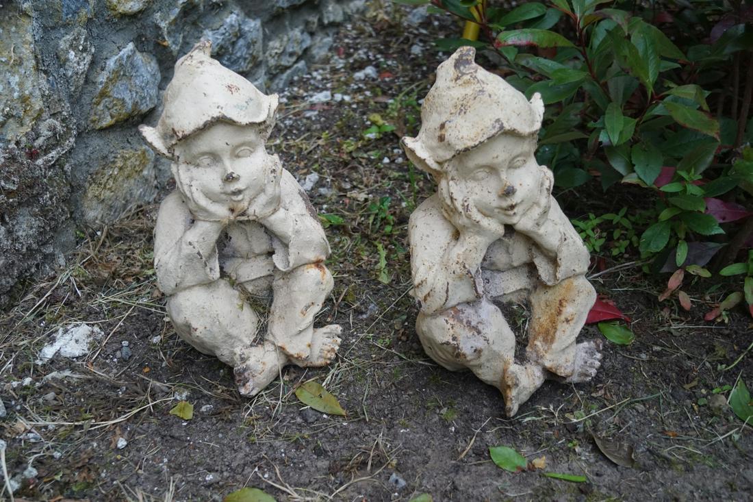 PAIR OF CAST IRON PIXIES: Pair of cast iron pixies. 38 cm. high; 18 cm. wide Approximate Time: 16:02 Lot No: 737 Category: Garden & Decorative Objects